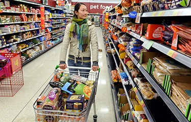 A U.K. shopper in a grocery aisle