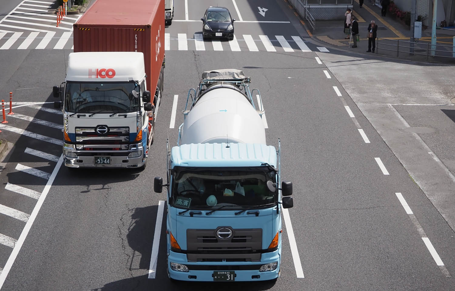Japanese trucks making their way through the streets of Tokyo, Japan