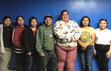 A group of former Eastern Fisheries employees impacted by the recent change in employment.