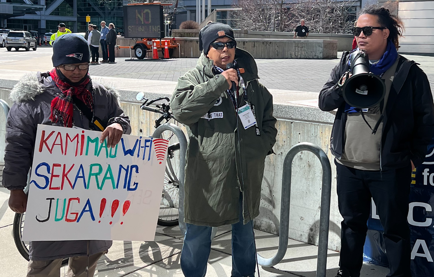 Adrie Nelwan (middle) shares the story of a fishing injury he sustained aboard a Taiwanese vessel in July 2021