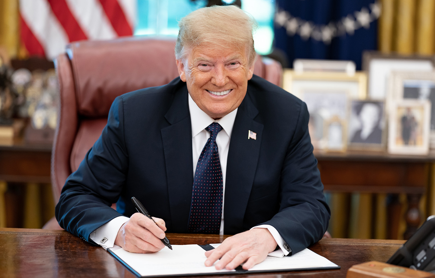 Donald Trump signs a memoradum of support for the lobster industry during his first term as U.S. president | Photo courtesy of The White House/Wikimedia Commons