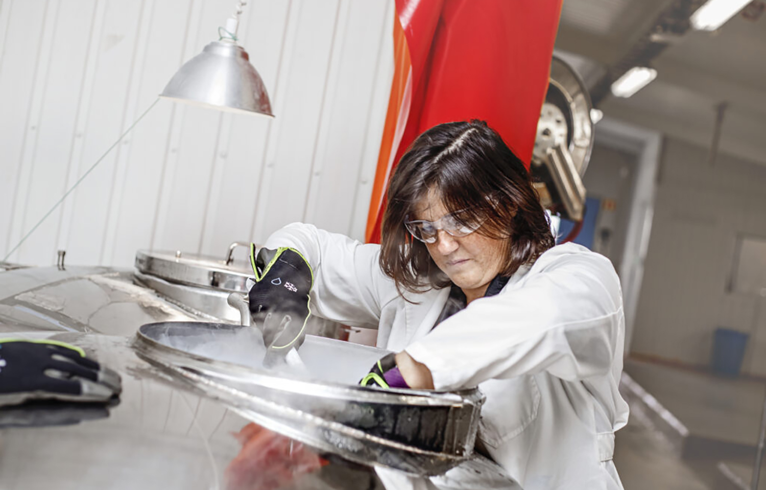 Benchmark Genetics Salmon Ova Quality Manager Rosana Estevez working in a Benchmark lab