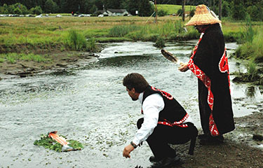 Jamestown S'klallam Tribe members on a river in Washington State.