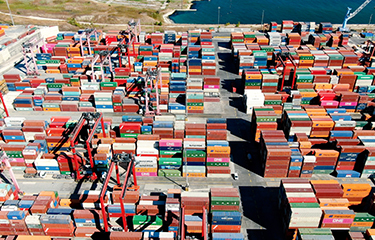 A shipping port filled with shipping containers.