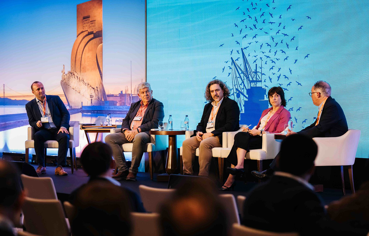 Jim Cannon (middle) presenting at the 2024 IFFO annual conference in Lisbon, Portugal