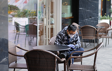 A lone diner at a restaurant in Shanghai.