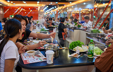 Customers at a restaurant in China.