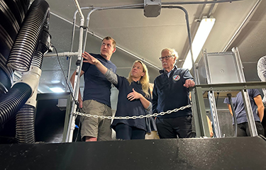 U.S. Senator Angus King being shown some of Kingfish Maine's equipment during a visit to their facilities.