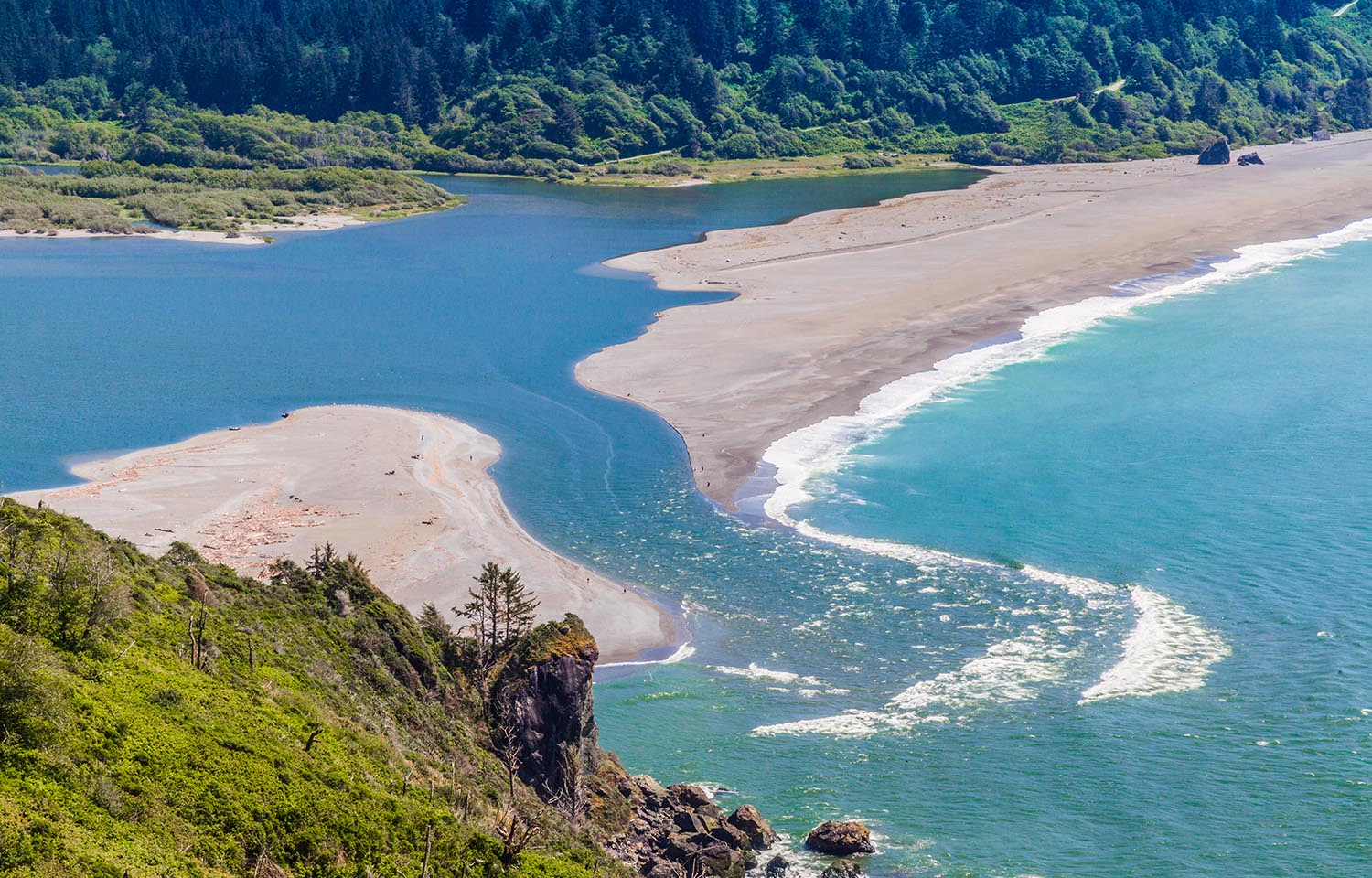 The Klamath River in California emptying into the Pacific Ocean