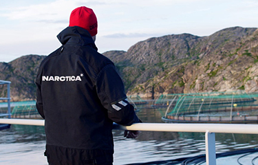 An Inarctica employee at a salmon farm.