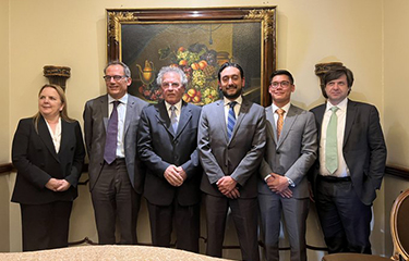 The staff of Industrial Pesquera Santa Piscila and the World Bank posing for a photo.