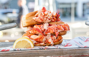 A classic Maine lobster roll from Cousins Maine Lobster.