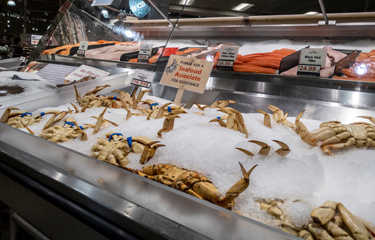 Dungeness crab and salmon for sale in a Washington supermarket.