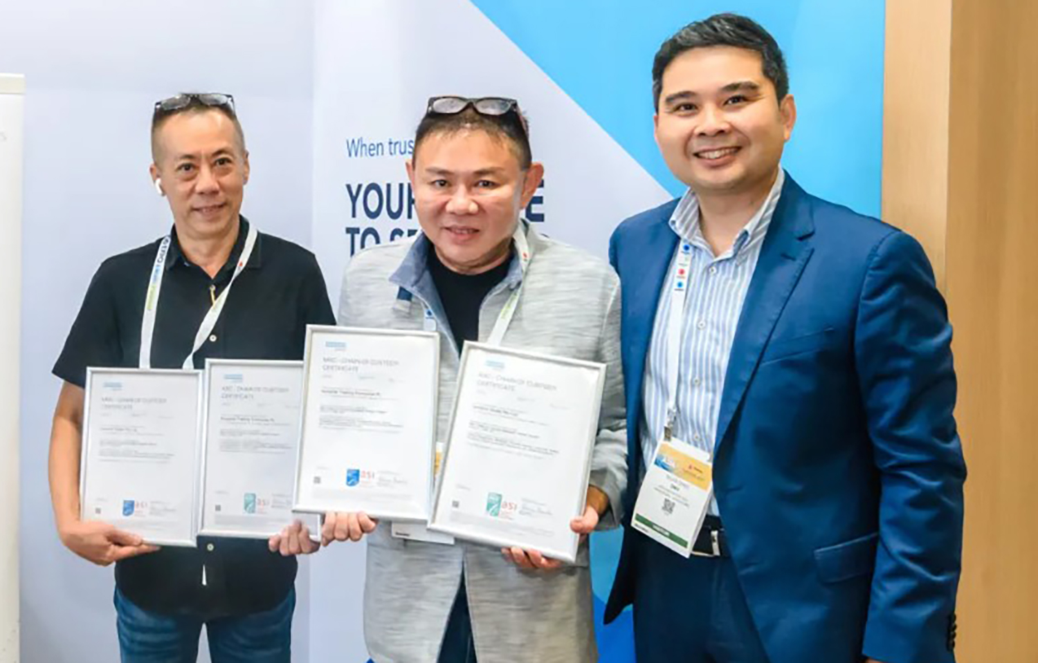 Anthony Lim, manager at Junshin Sushi, Chris Tan, director at Songlilai Trading Enterprise PL, and Silas Ding, area manager for Southeast Asia at DNV, celebrated the certifications at Seafood Expo Asia in Singapore