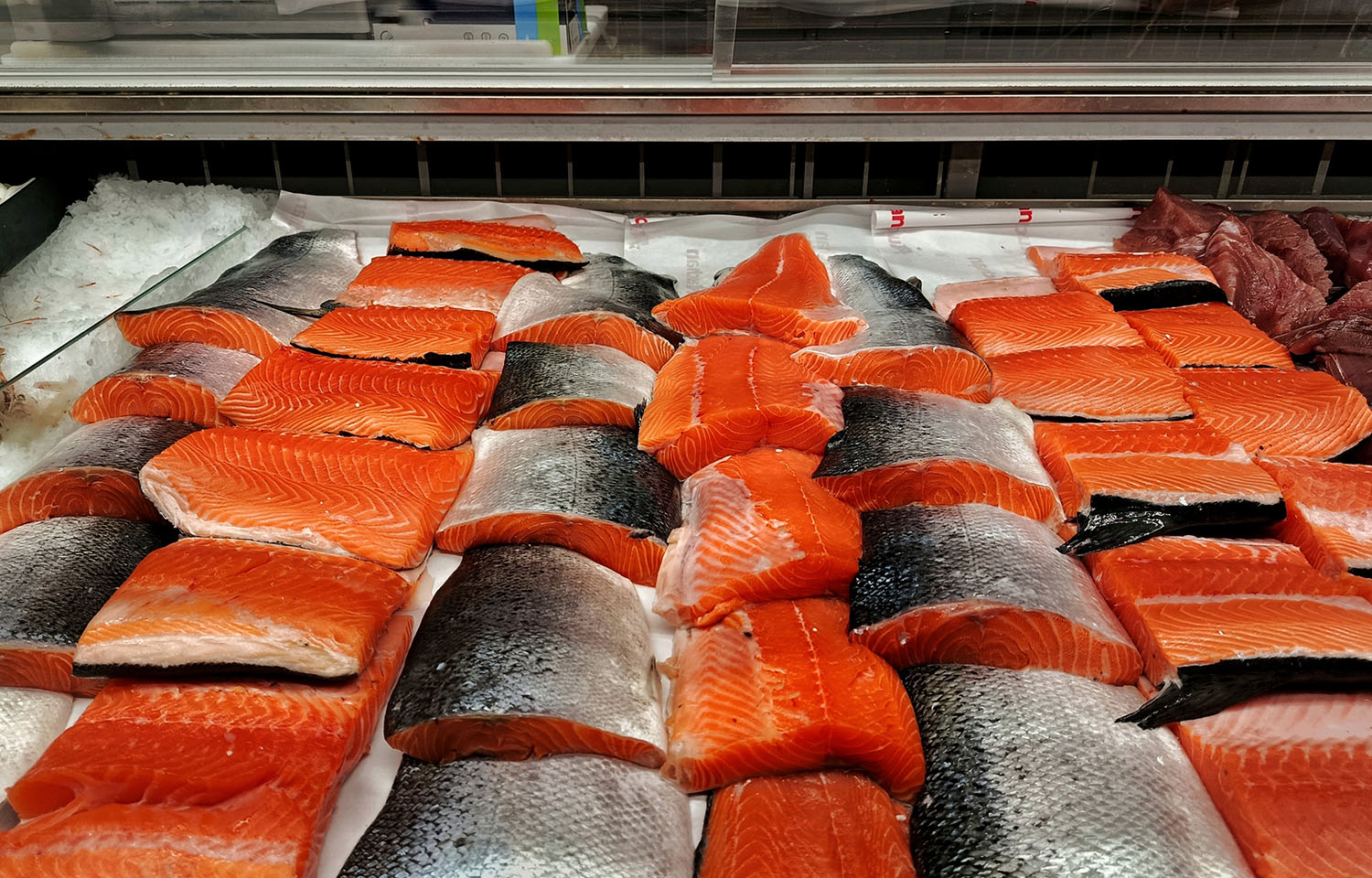 cut salmon on display for sale in Norway