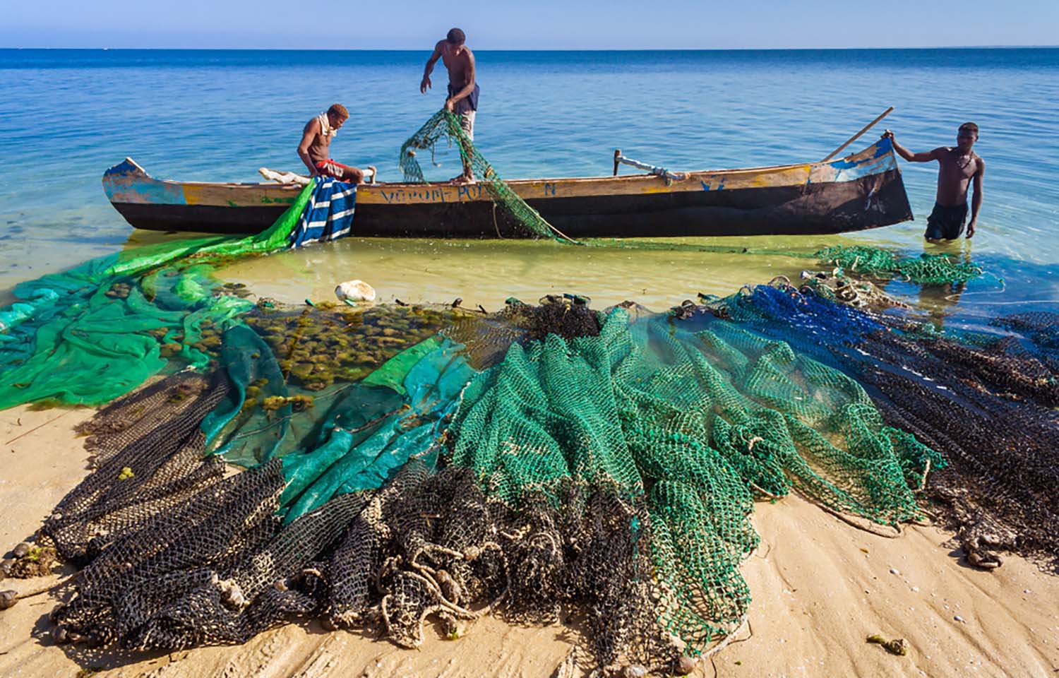 Madagascar fishers prepare their nets