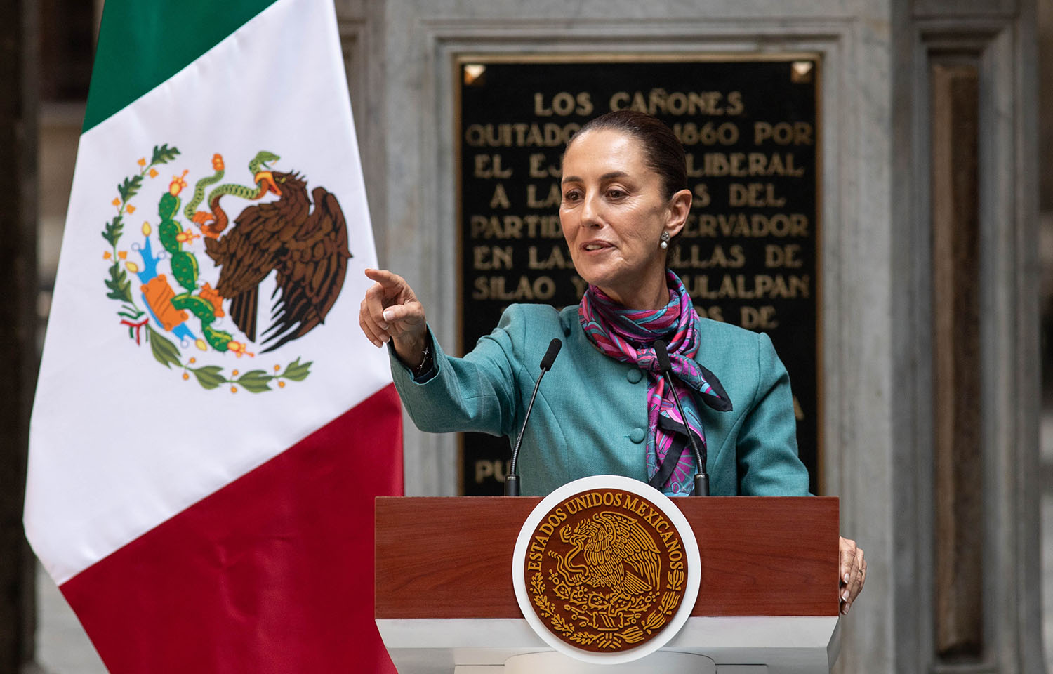 Mexican President Claudia Sheinbaum at a podium