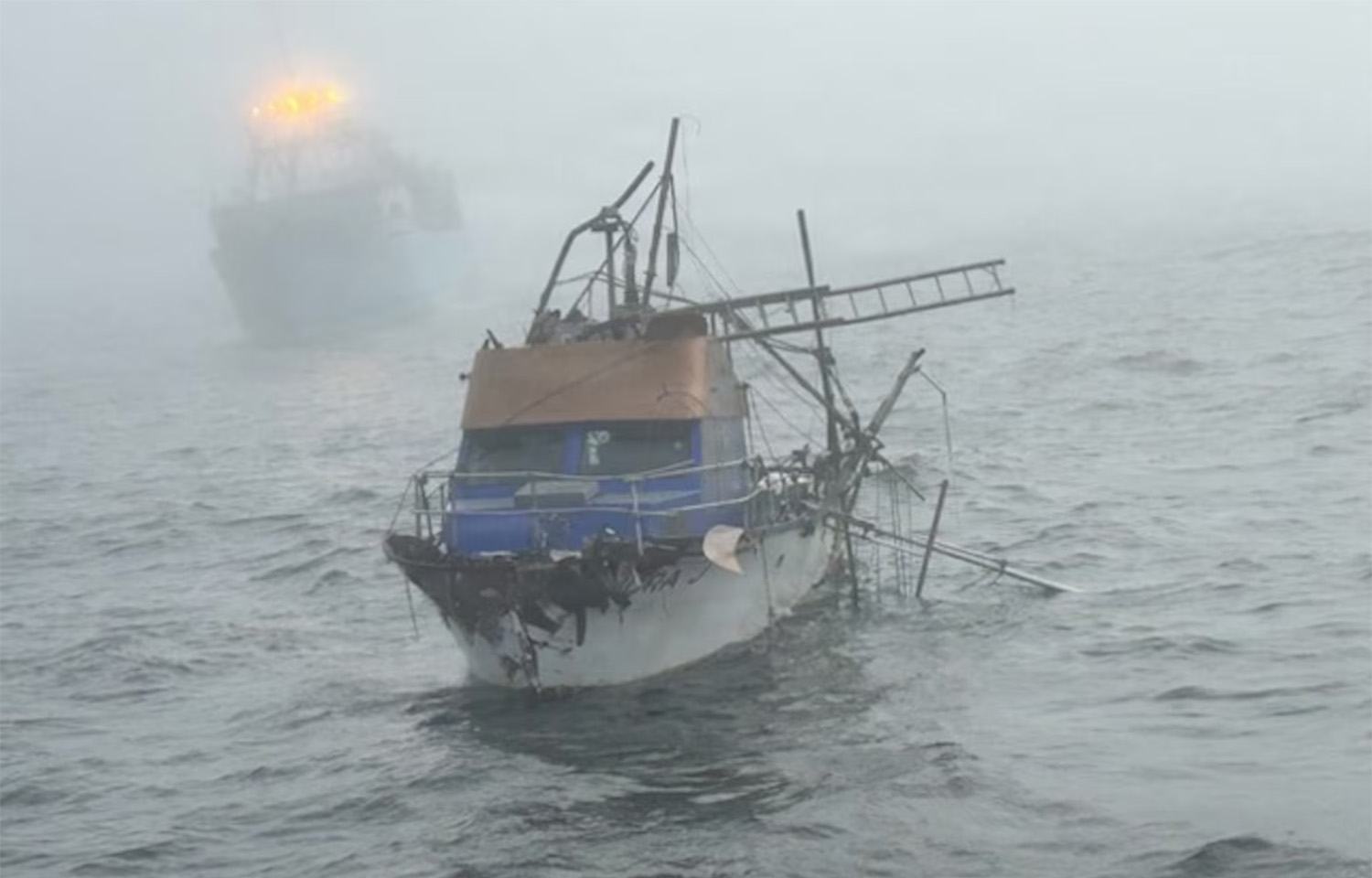 A photo in the fog of the fishing vessel Nora J, which sank after a collision with another fishing vessel