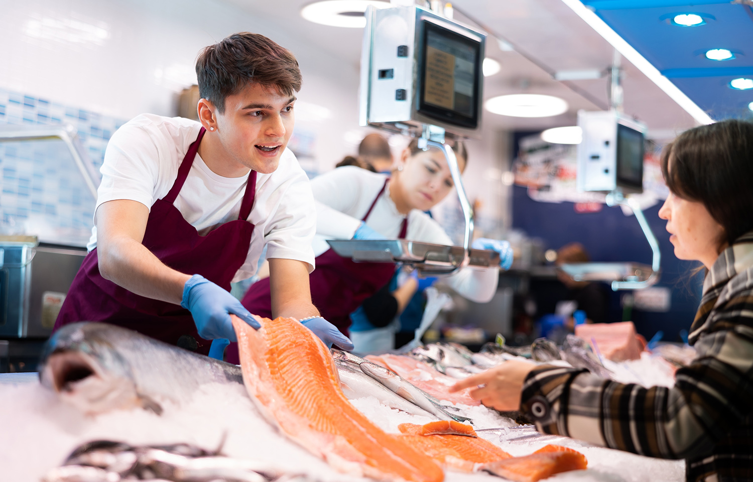 A photo of salmon at a seafood counter
