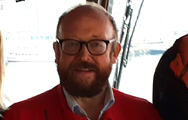 A headshot of Carl-Erik Arnesen.