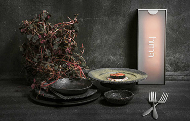 A plate of the Hima Seafood's trout and the packaging its products will come in.