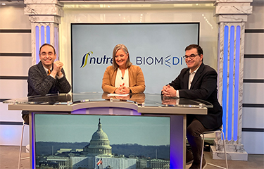 Officials with Nutreco and BiomEdit announce their new commercial partnership.