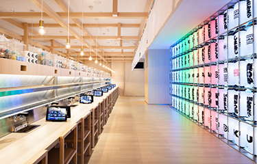 The interior of a new Kura Sushi restaurant.