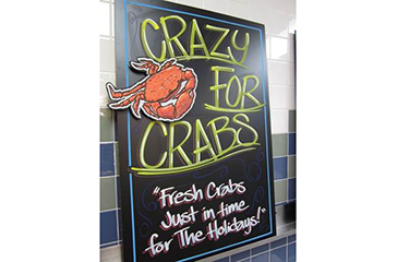 A sign for a sale on crabs in time for the holiday season.