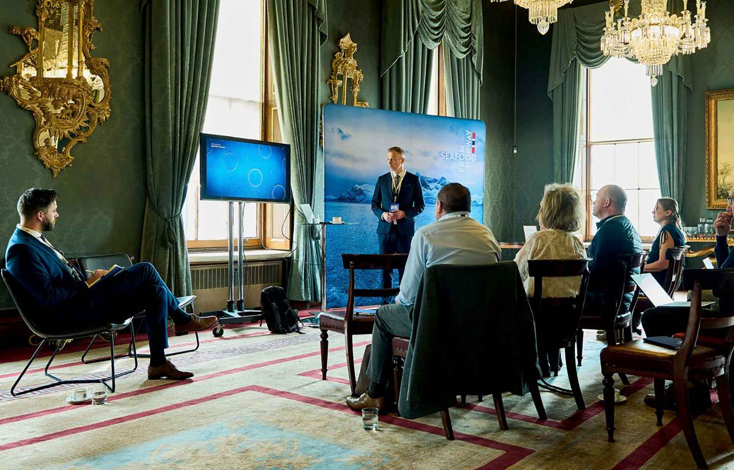 Norwegian Seafood Council (NSC) Consumer Behavior Analyst Lars Moksness presenting at the 2025 Norway-U.K. Seafood Summit
