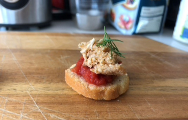 A spread of plant-based tuna analogue on a piece of bread.