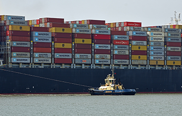 Boat with shipping containers
