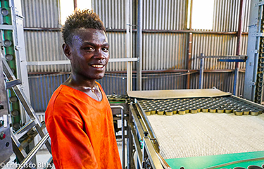 Facility worker at Bina Hrobour Tuna Processing