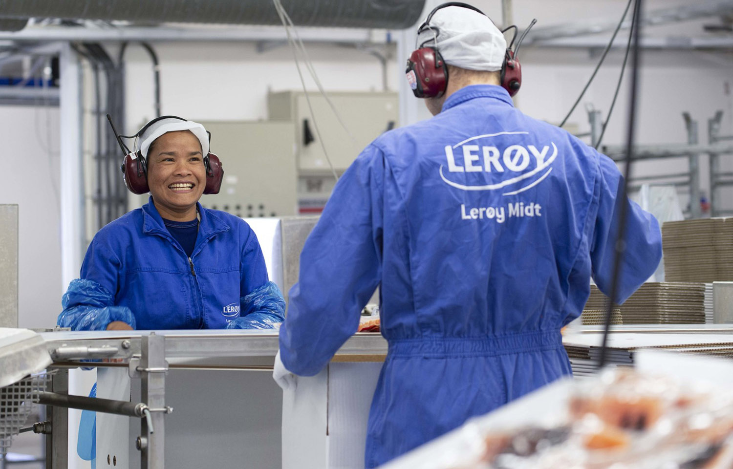 Lerøy employees processing seafood