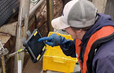 A fisher using an OPTECS system.