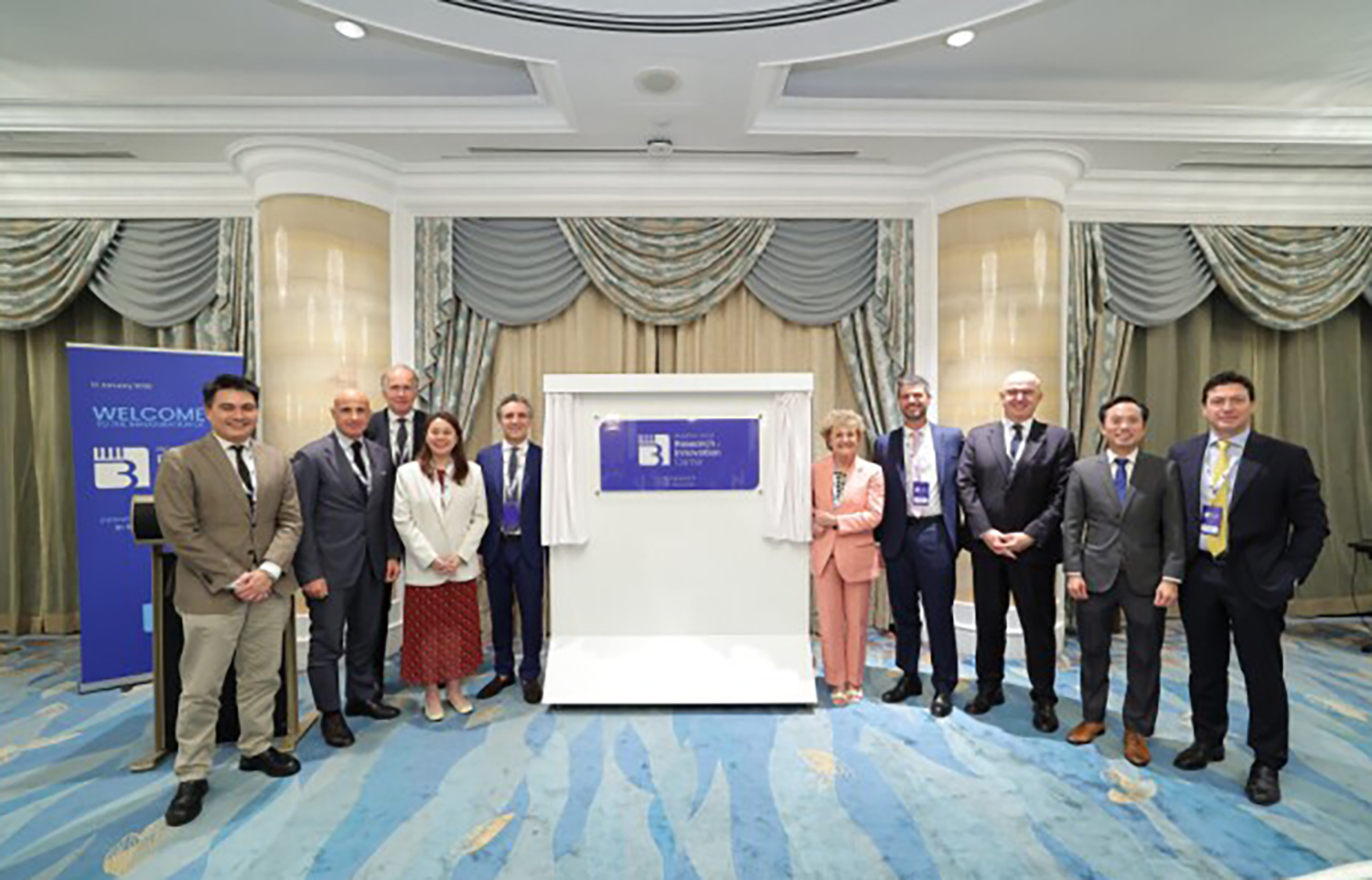 Bolton representatives celebrating the opening of its new research center in Singapore