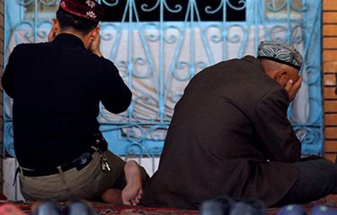 Two Uyghurs photographed as part of a United Nations investigation