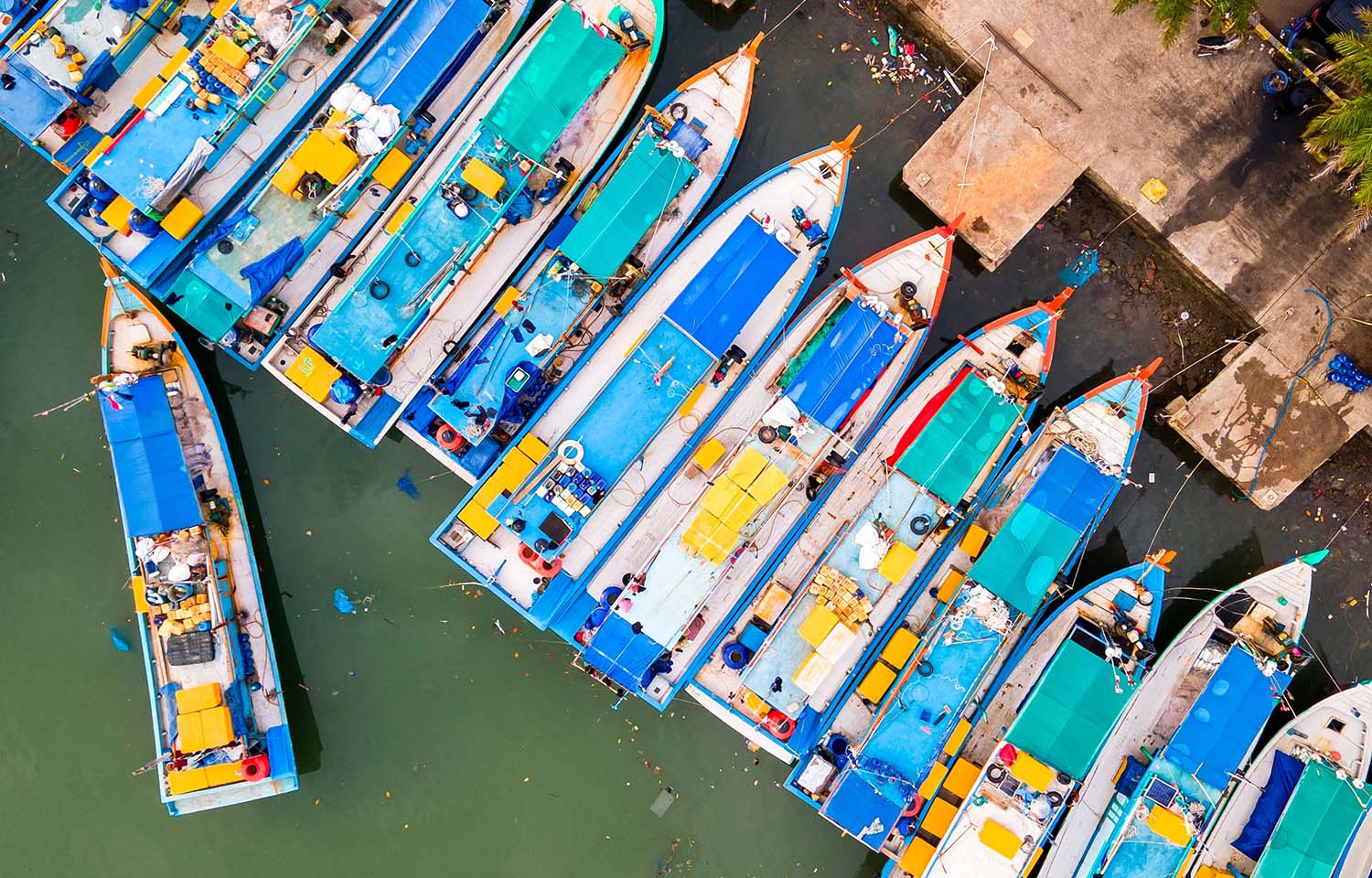A top-down view of fishing boats in Indonesia