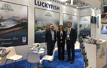 Representatives of Lucky Fish at a trade show.