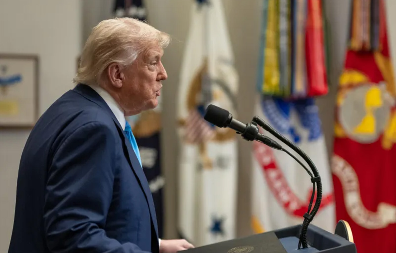 U.S. President Donald Trump standing at a podium
