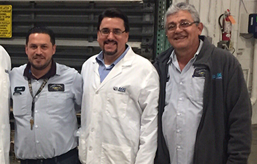 Alfa Gamma Group CEO Santiago Alvarez, center.