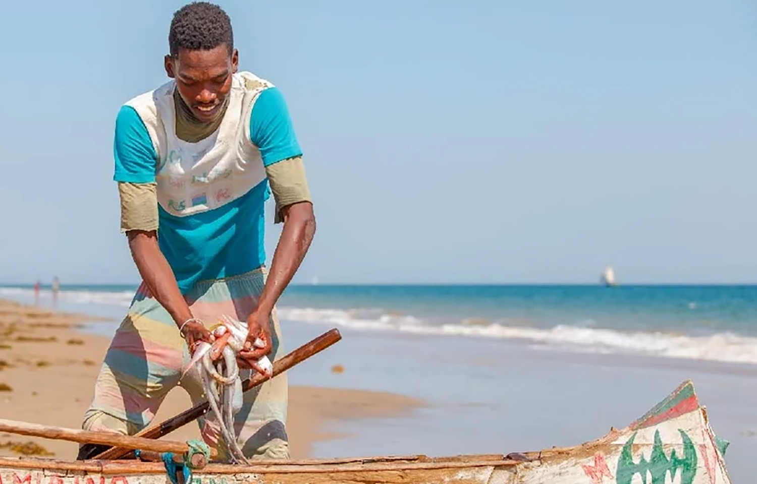 A Benin fisherman readying his boat