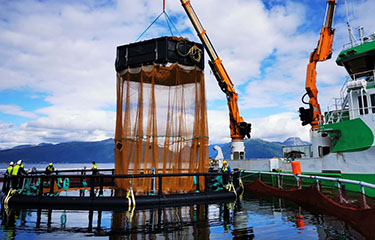 Cermaq's iFarm being installed at a farm in Hellarvika, Steigen, Norway.