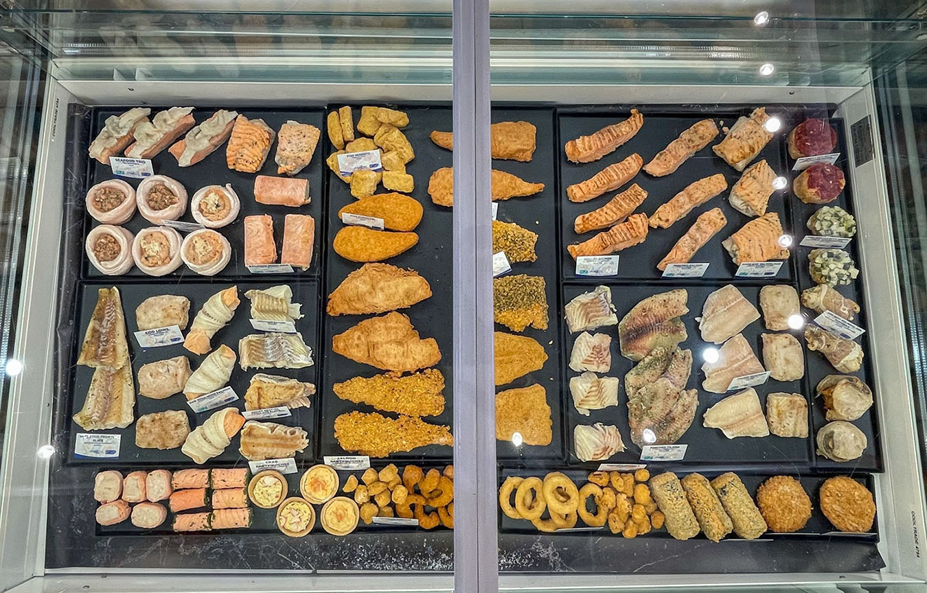 An array of AMfish's products in a display case.