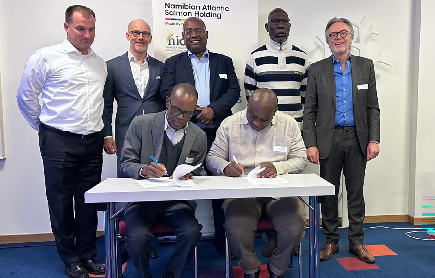 Stakeholders signing a share underwriting agreement in Bergen, Norway