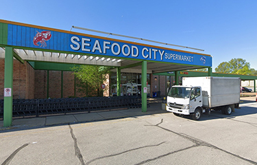A Google Streetview image of the Seafood City storefront.