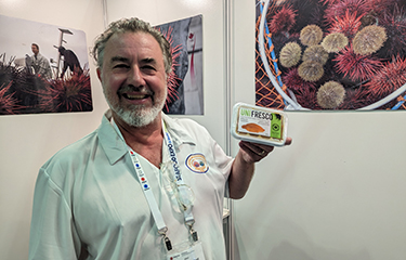 Fraser Rieche with UniFresco showing off the company's new processed uni product
