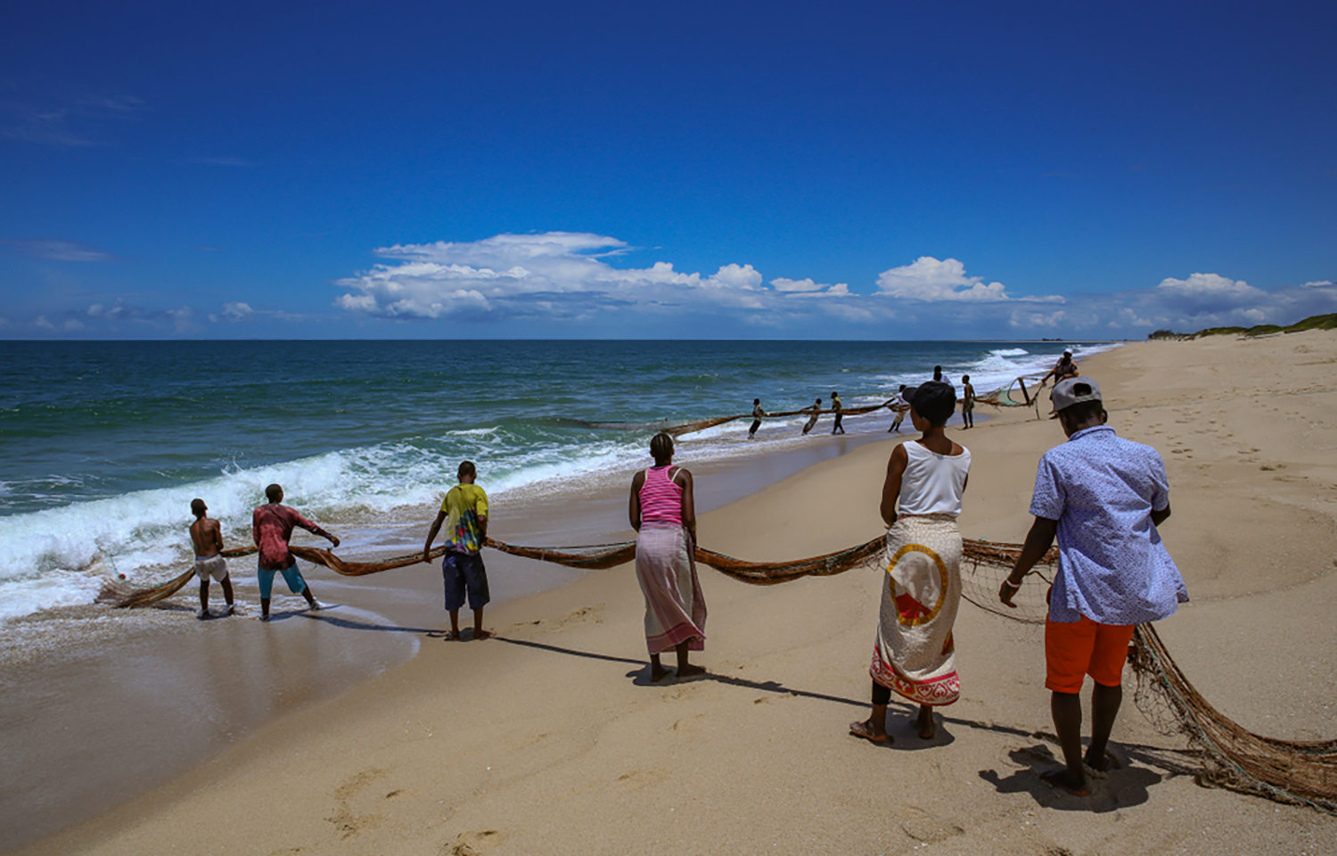 Mozambicans fishing near the country's capital of Maputo
