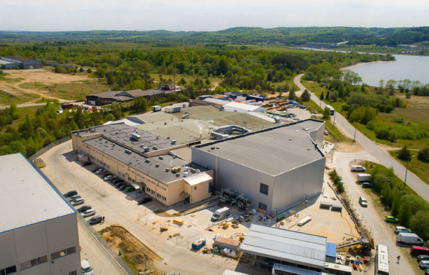 An aerial view of the exterior of a Graal Group processing facility in Poland