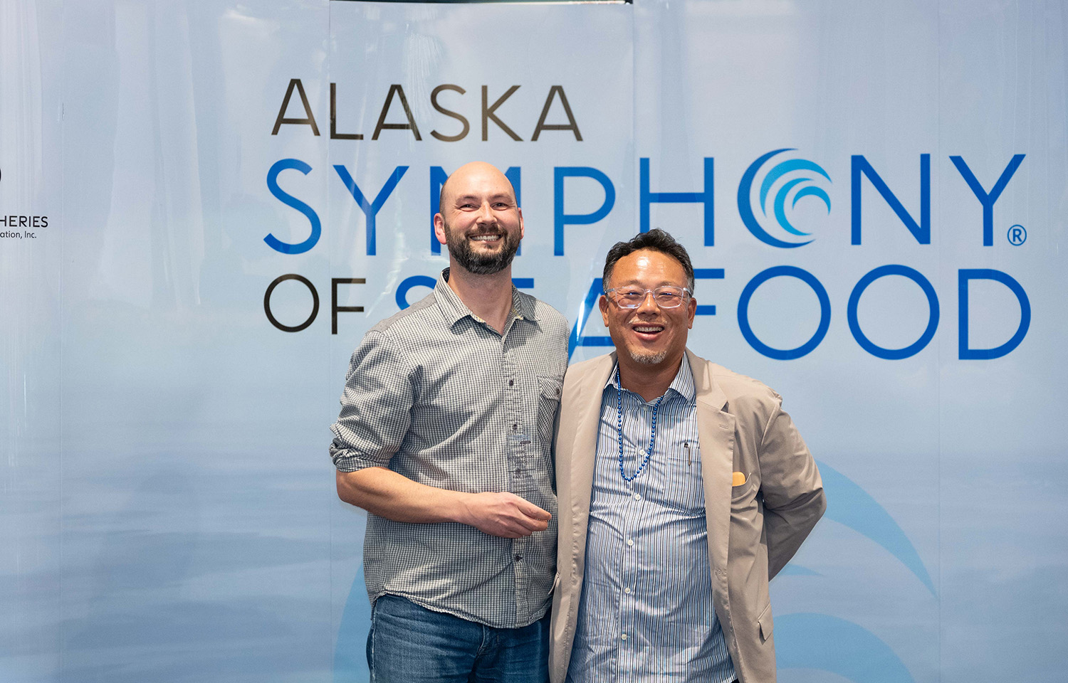 E&E Foods' representatives accepting the Alaska Symphony of Seafood award for Best New Foodservice Product