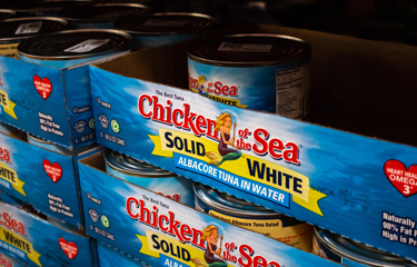 Chicken of the Sea Tuna on a shelf.